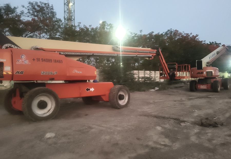 JLG 1200SJP boom lift deployed after hours for a 24x7 industrial project in Gujarat