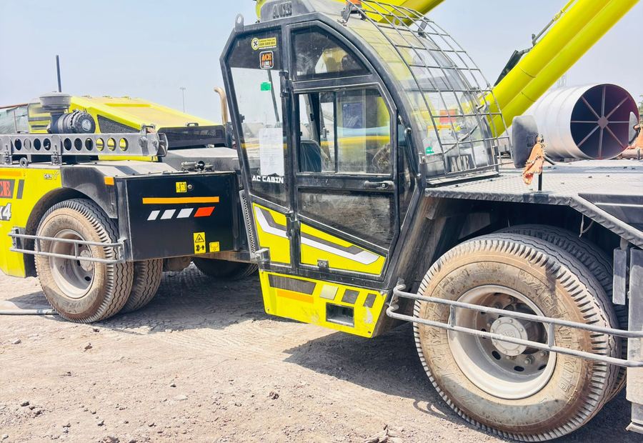 ACE pick and carry crane with AC cabin on standby at an industrial yard in Ankleshwar